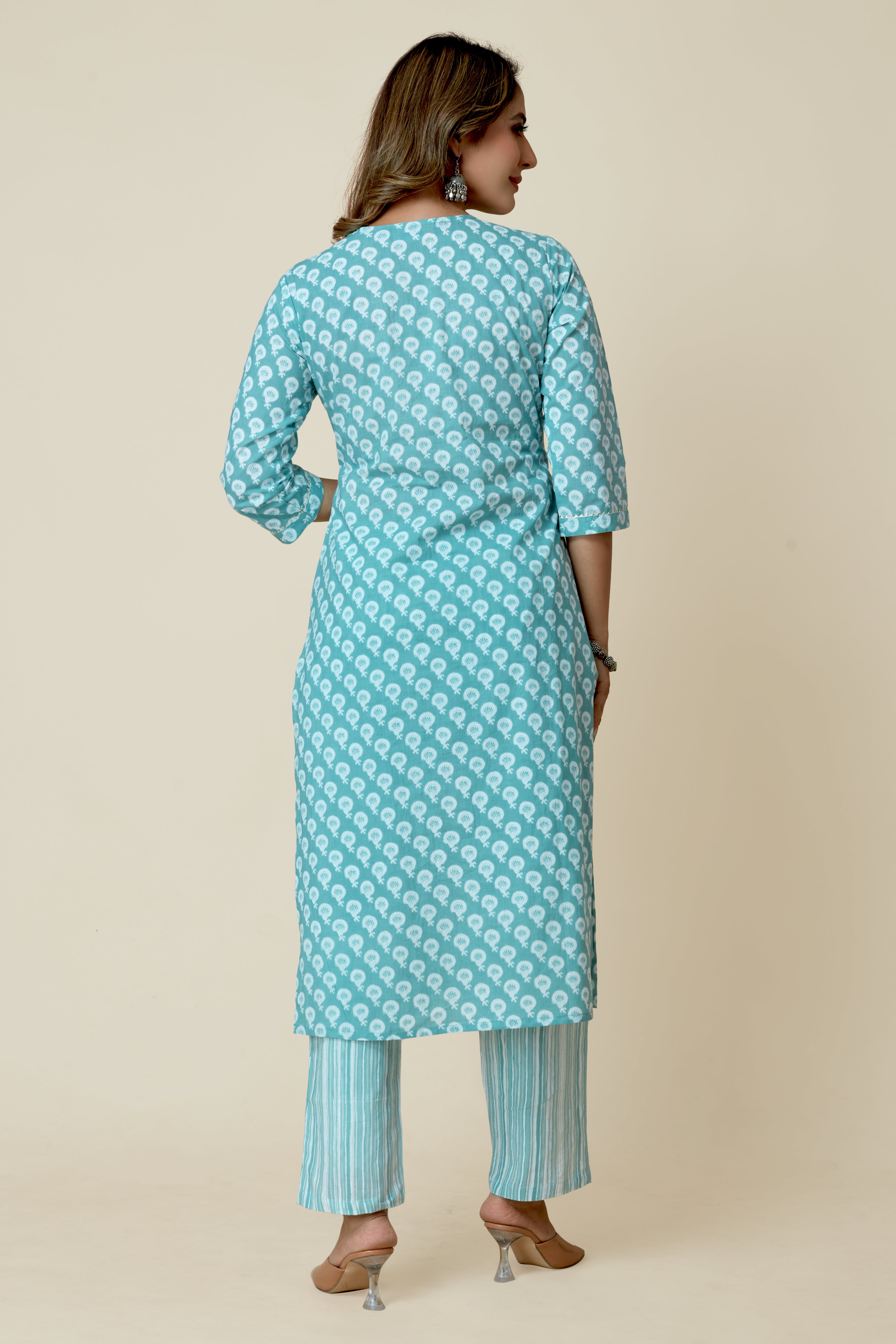 light blue colored kurta pant set