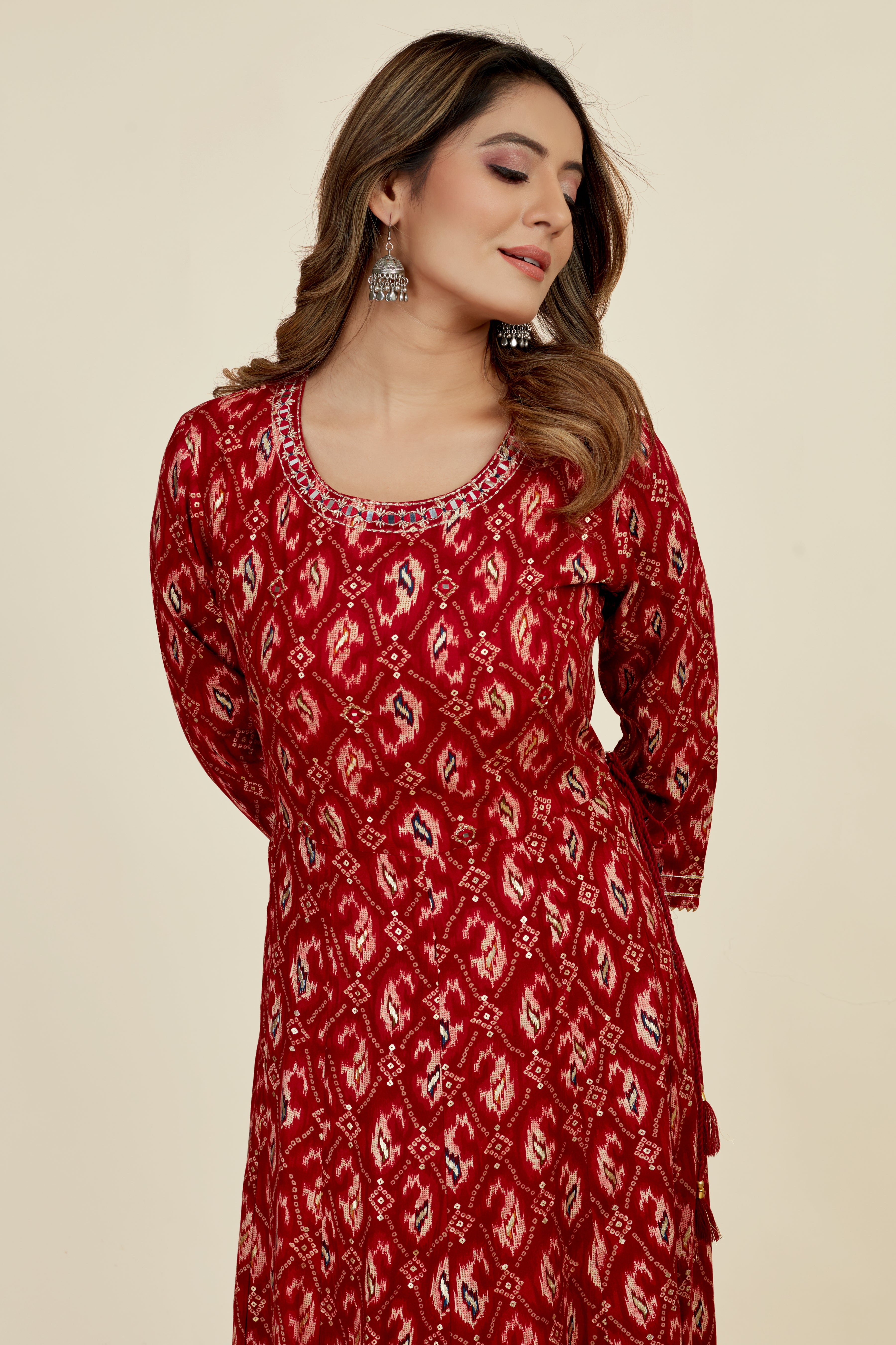 maroon colored flared kurta